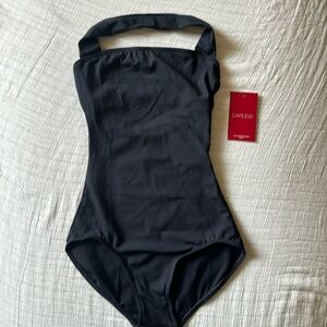 Capezio’s "Team Basic" halter leotard. A ballet cut leg line and shelf lining.